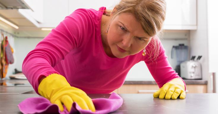 Person Cleaning Hard Stains